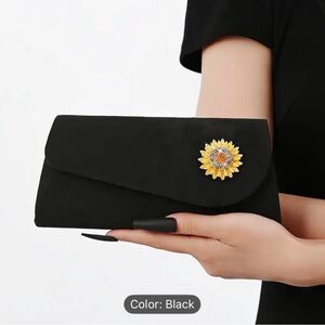 Elegant Black Clutch with Sunflower Accent
